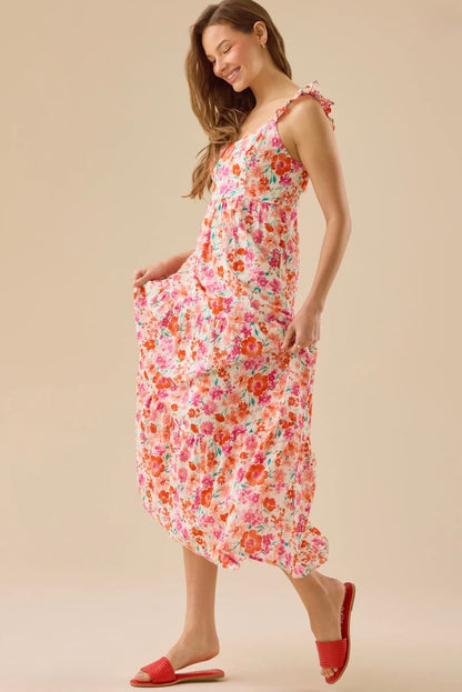Woman wearing a floral dress on a beige background